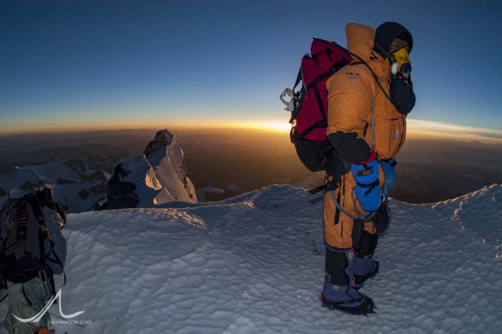Phuru Sherpa at Mushroom Rock (28,300 feet) on Mount Everest's Northeast Ridge at sunrise on May 30, 2003.