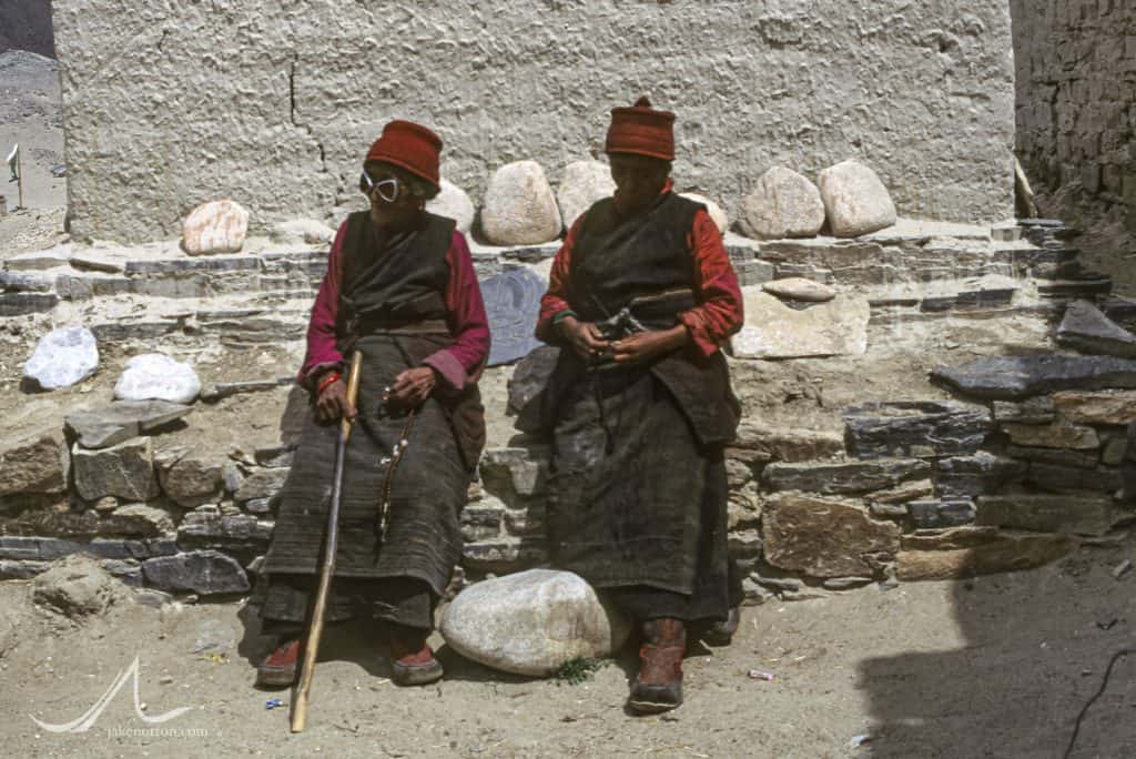 An elderly Tibetan woman at Rongbuk Monastery wearing goggles from the 1933 British Everest Expedition.