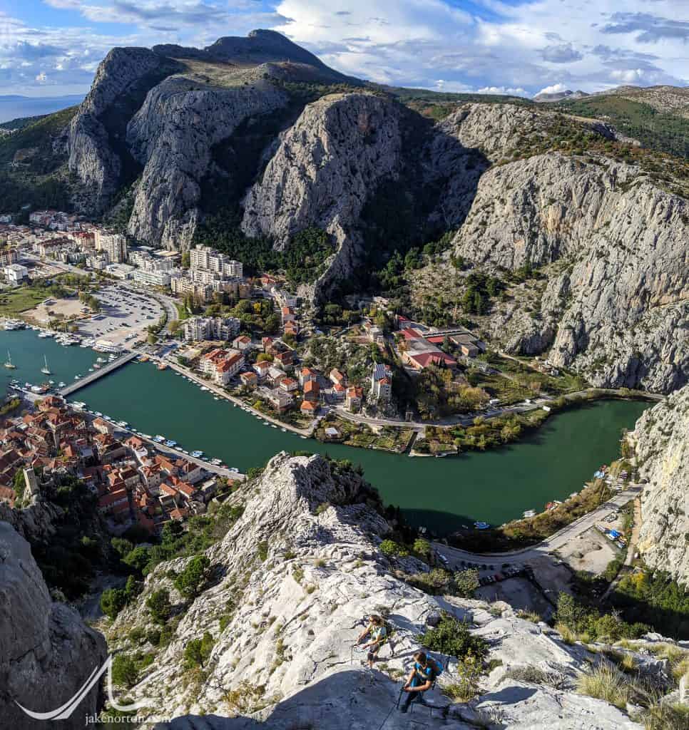 Climbing a via ferrata above the Cetina River in Omis, Croatia.