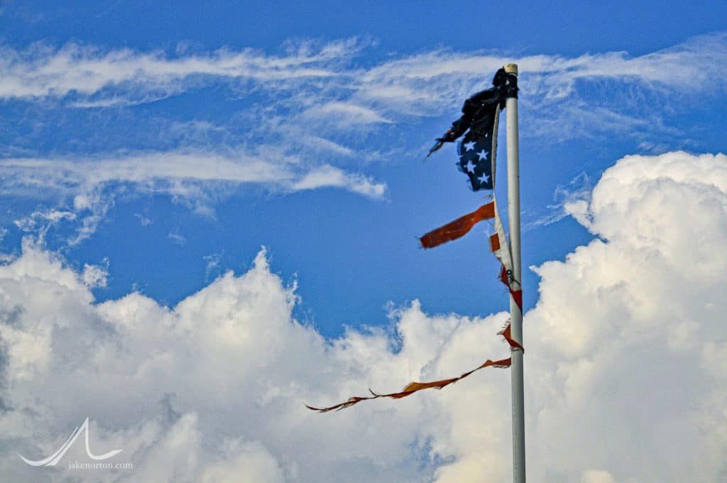 A tattered American flag - having survived Hurricane Gustav - still flies over the bayou of Cocodrie, Louisiana, near Houma.