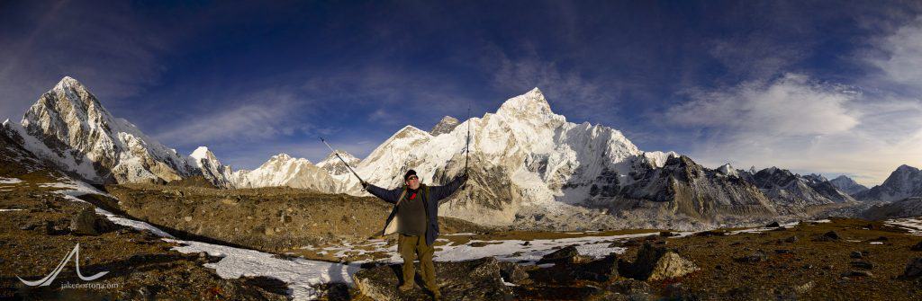 Art Adams celebrating near the top of Kala Pattar with (left to right) Pumori, Lingtren, Changtse, Mount Everest, Nuptse, and Baruntse behind.