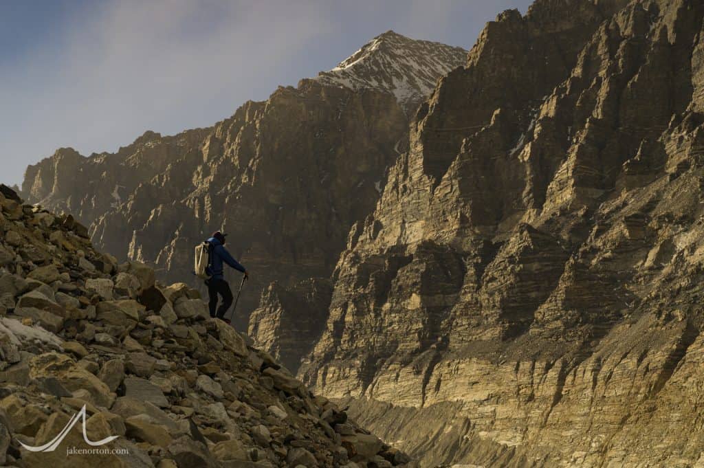 Sid Pattison high on the side slopes of the East Rongbuk Glacier, Tibet. Kellas Rock Peak rises behind.