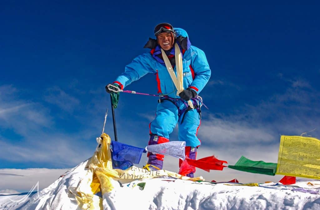 Karma Rita Sherpa on the summit of Mount Everest, May 18, 2002.