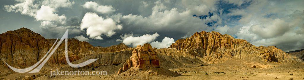 Ruins of an ancient Buddhist chorten accent the spectacular landscape of Upper Mustang, Nepal.