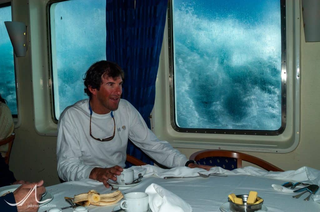 Dave Hahn enjoying a nerve wracking breakfast as the MS Endeavour is battered by a severe storm with 50-foot seas between the Falkland Islands and Ushuaia.