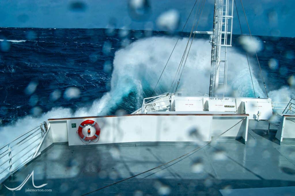 Massive waves break over the bow of the MS Endeavour as it is battered by a severe storm with 50-foot seas between the Falkland Islands and Ushuaia.