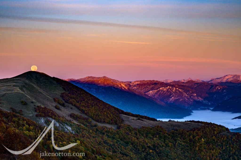 The full moon rises above a mountain hut in Biogradska Gora in the Dinaric Alps of Montenegro.