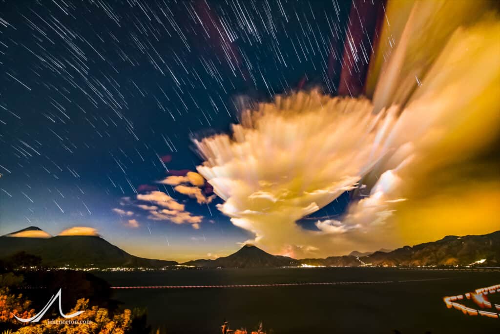 Sunset over Lake Atitlán, Guatemala, 2016. This image is from a timelapse of 1800+ images taken over five hours, time-stacked and re-rendered to show the accumulation of clouds and stars over the entire duration. 
